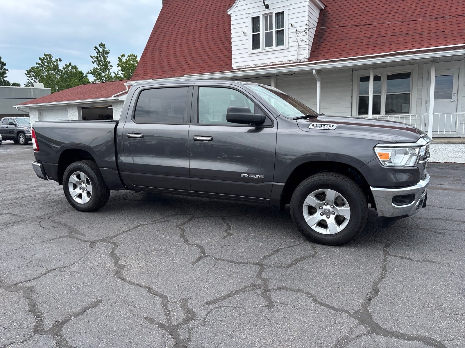 2019 RAM 1500 Big Horn/Lone Star Crew Cab 4x4 5'7" Box in Gray — front three-quarter view