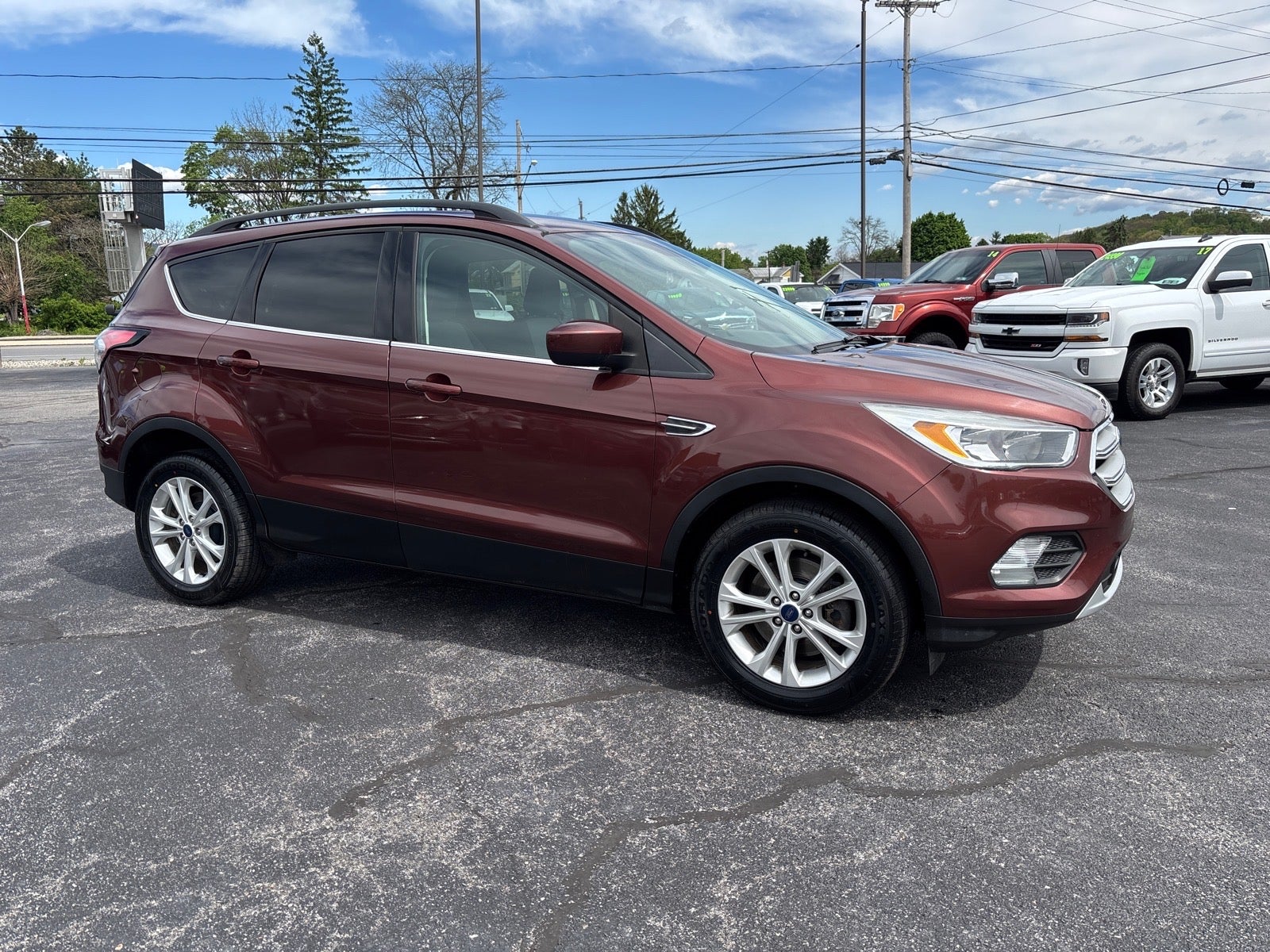 2018 Ford Escape SE in Red — front three-quarter view