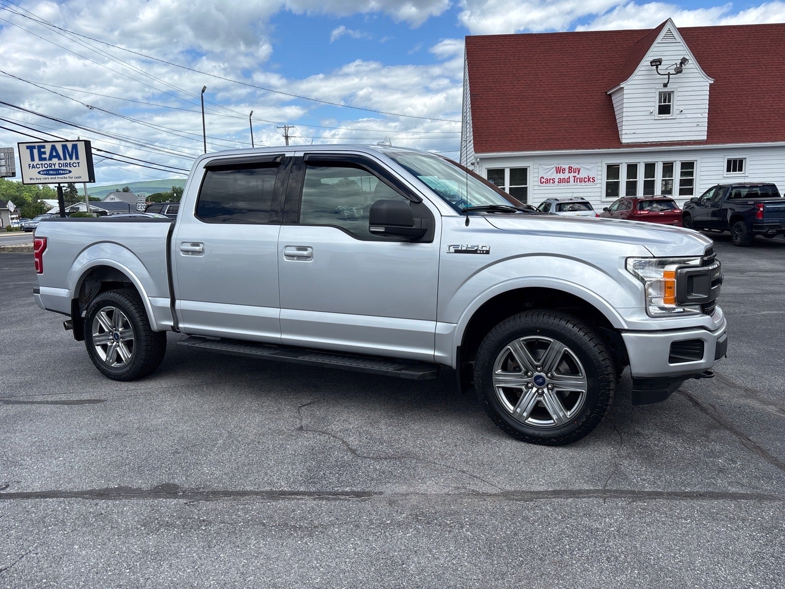 2018 Ford F-150 XLT in Black — front three-quarter view