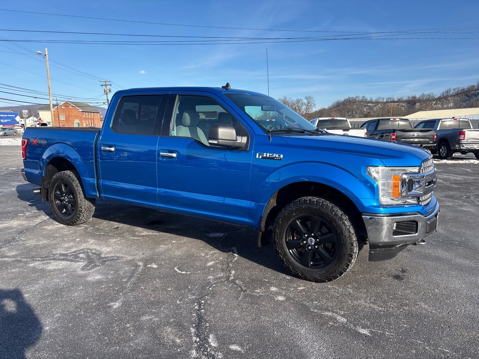 2019 Ford F-150 XLT in Blue — front three-quarter view