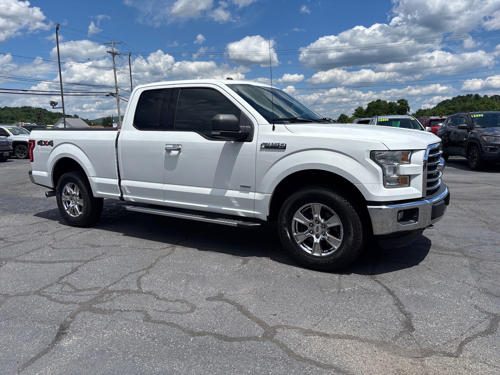 2016 Ford F-150 XLT in White — front three-quarter view