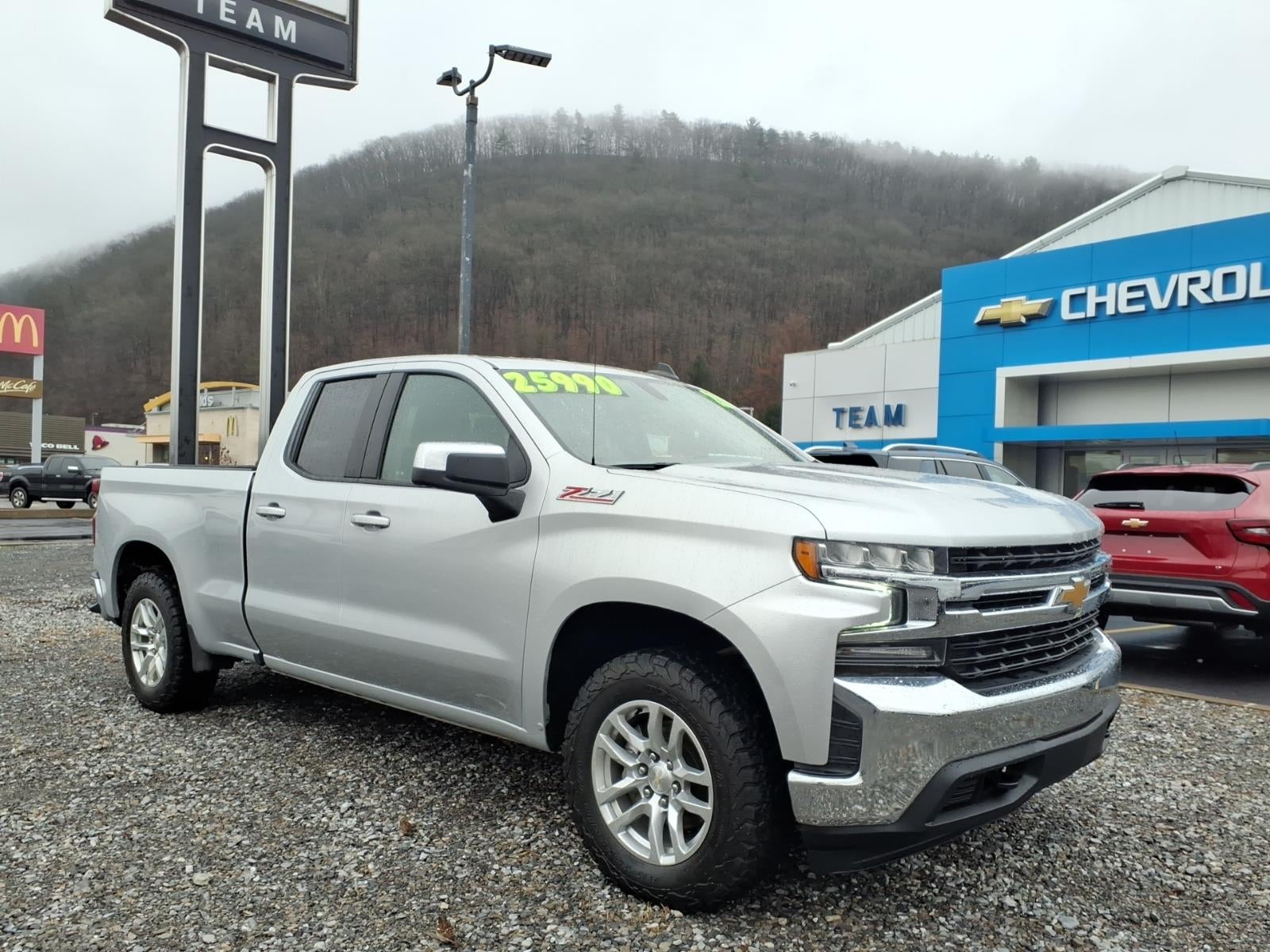 2021 Chevrolet Silverado 1500 LT in Silver Ice Metallic — front three-quarter view