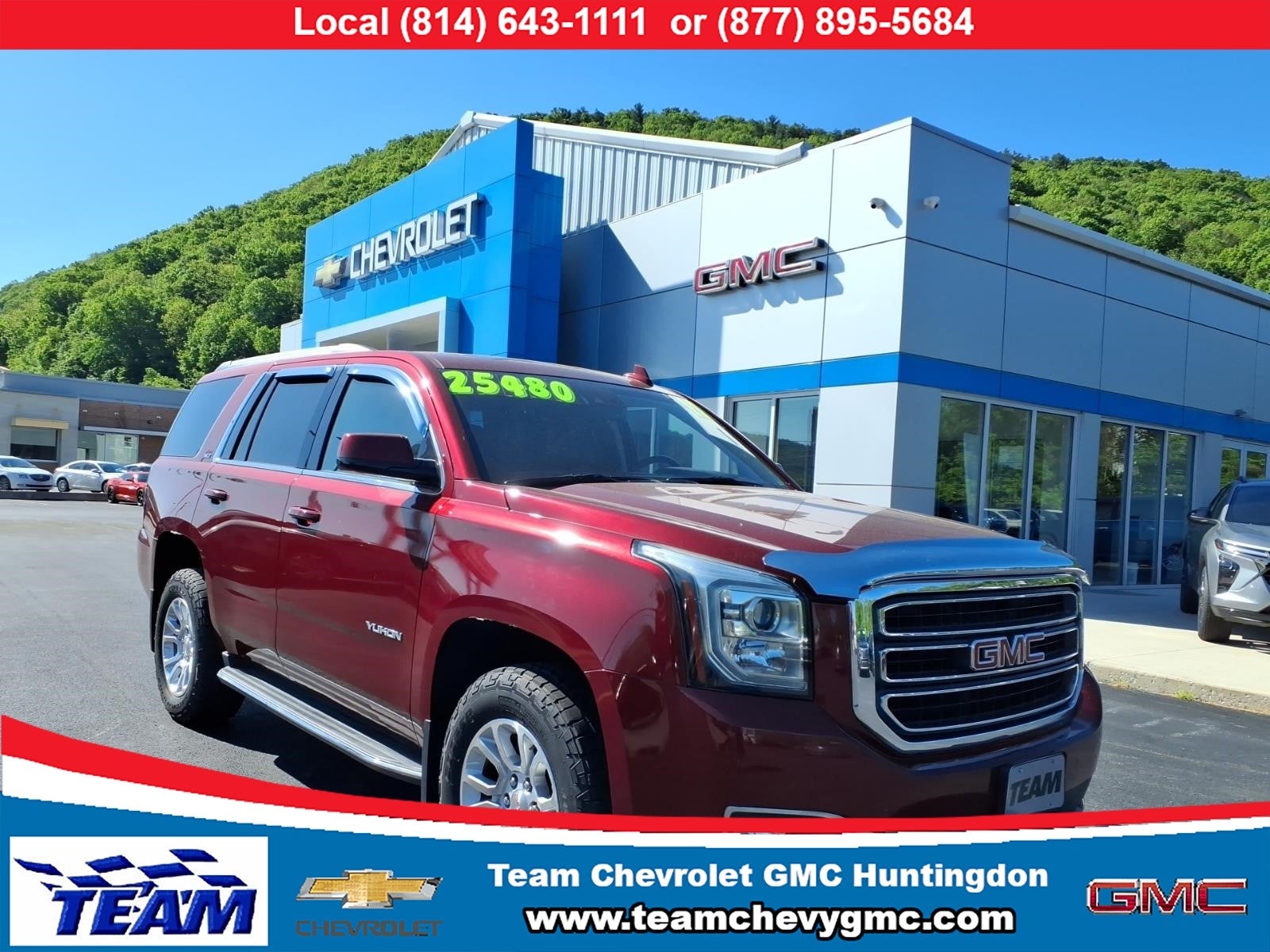 2017 GMC Yukon SLT in Crimson Red Tintcoat — front three-quarter view
