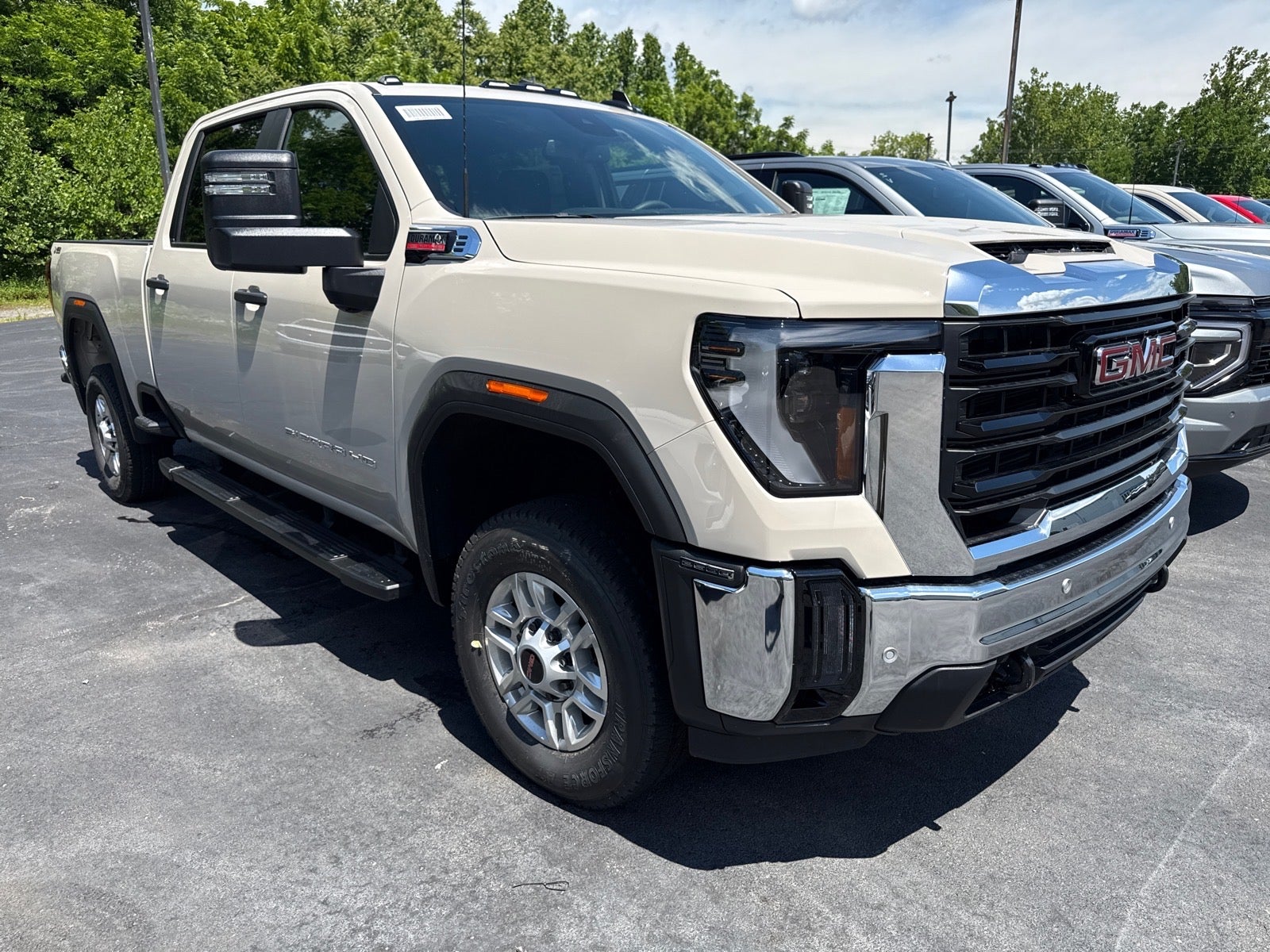 2026 GMC Sierra 2500 HD Pro in Coastal Dune — front three-quarter view