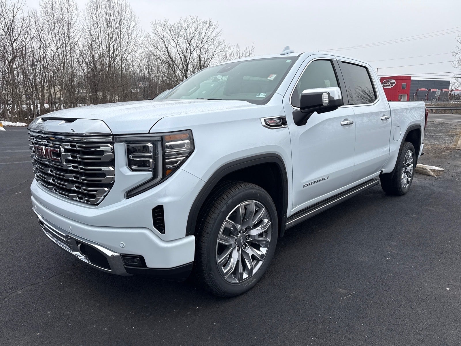 2026 GMC Sierra 1500 Denali in Glacier White Tricoat — front three-quarter view