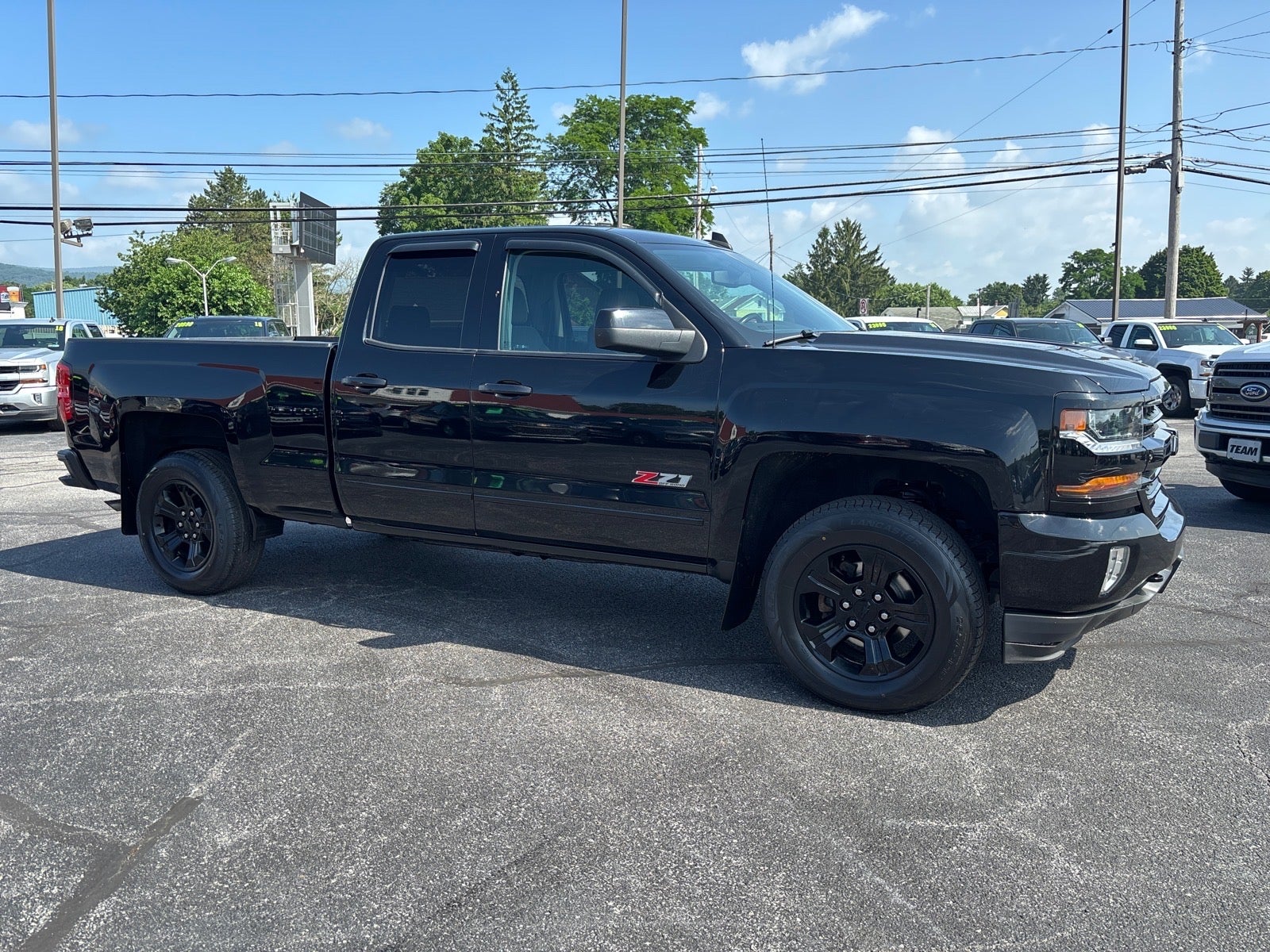2019 Chevrolet Silverado LD LT in Black — front three-quarter view