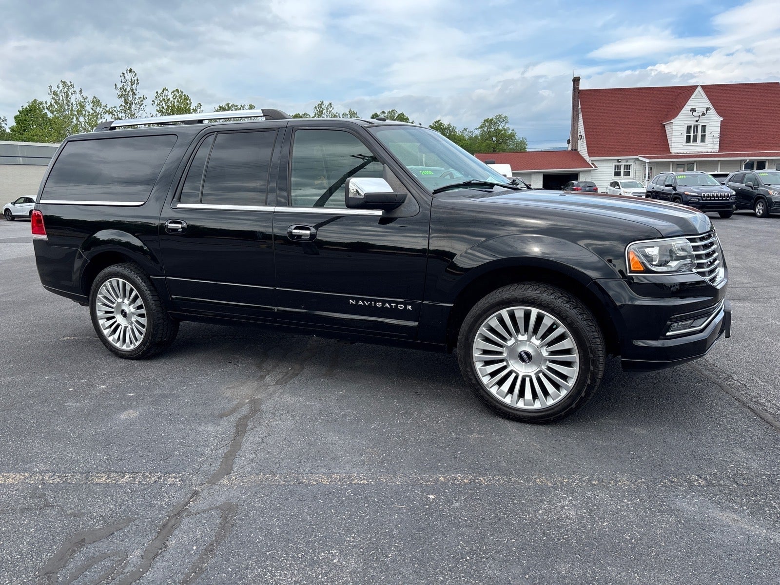 2017 Lincoln Navigator L Reserve in Black — front three-quarter view